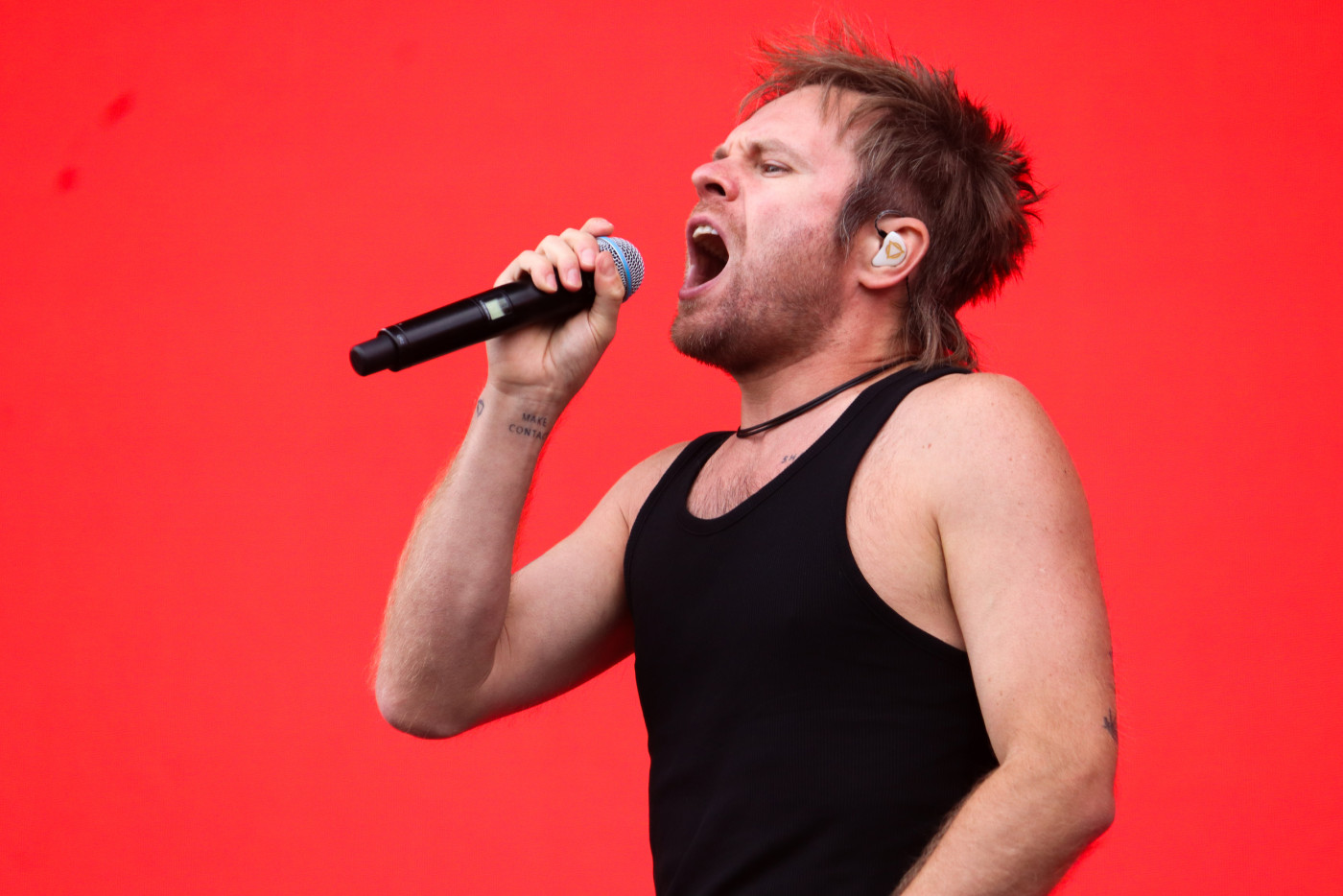Rou Reynolds onstage with You Me At Six