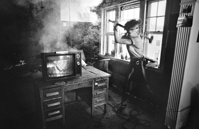 Wendy O Williams About To Destroy TV With A Sledgehammer